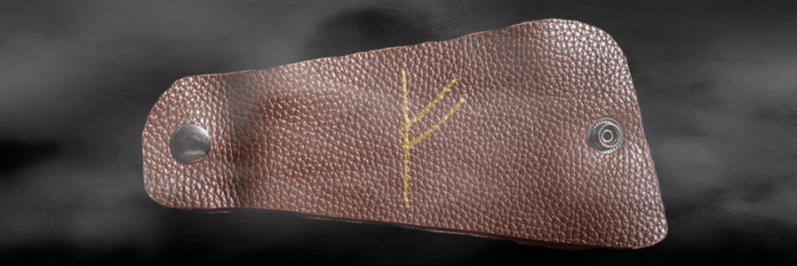 руна феху на шкірі як амулет удачі